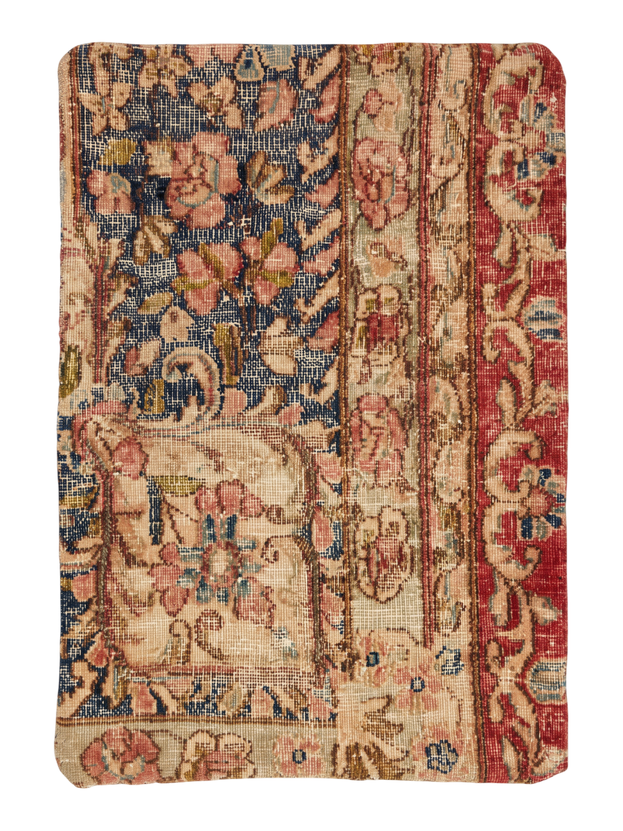 Vintage Persian hand-knotted cushion cover, flat lay