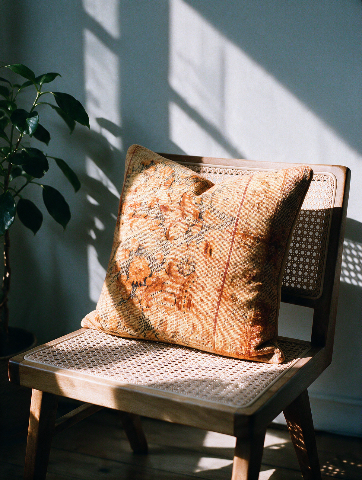Vintage Persian hand-knotted cushion cover styled lifestyle shot
