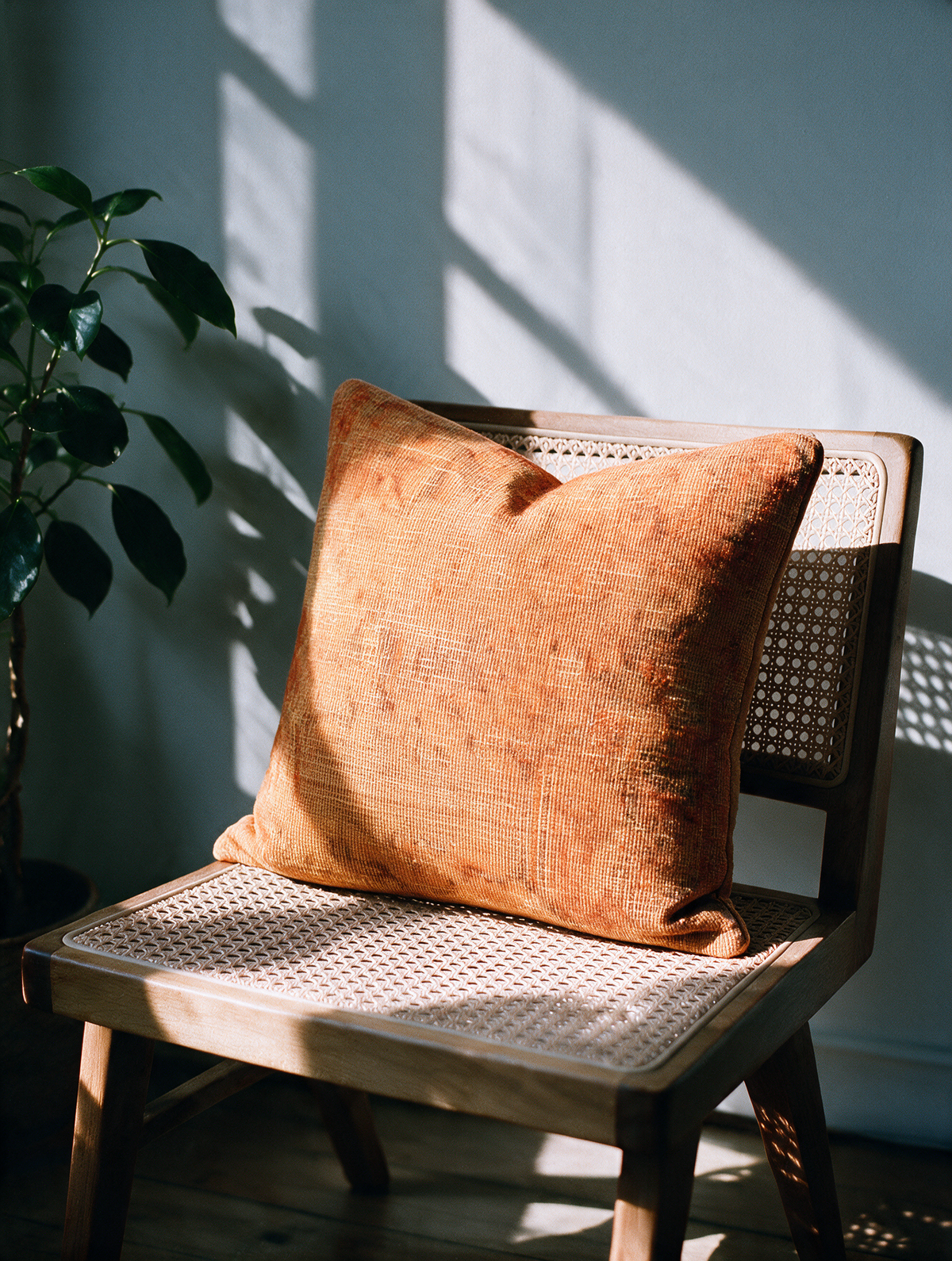 Vintage Persian hand-knotted cushion cover styled lifestyle shot
