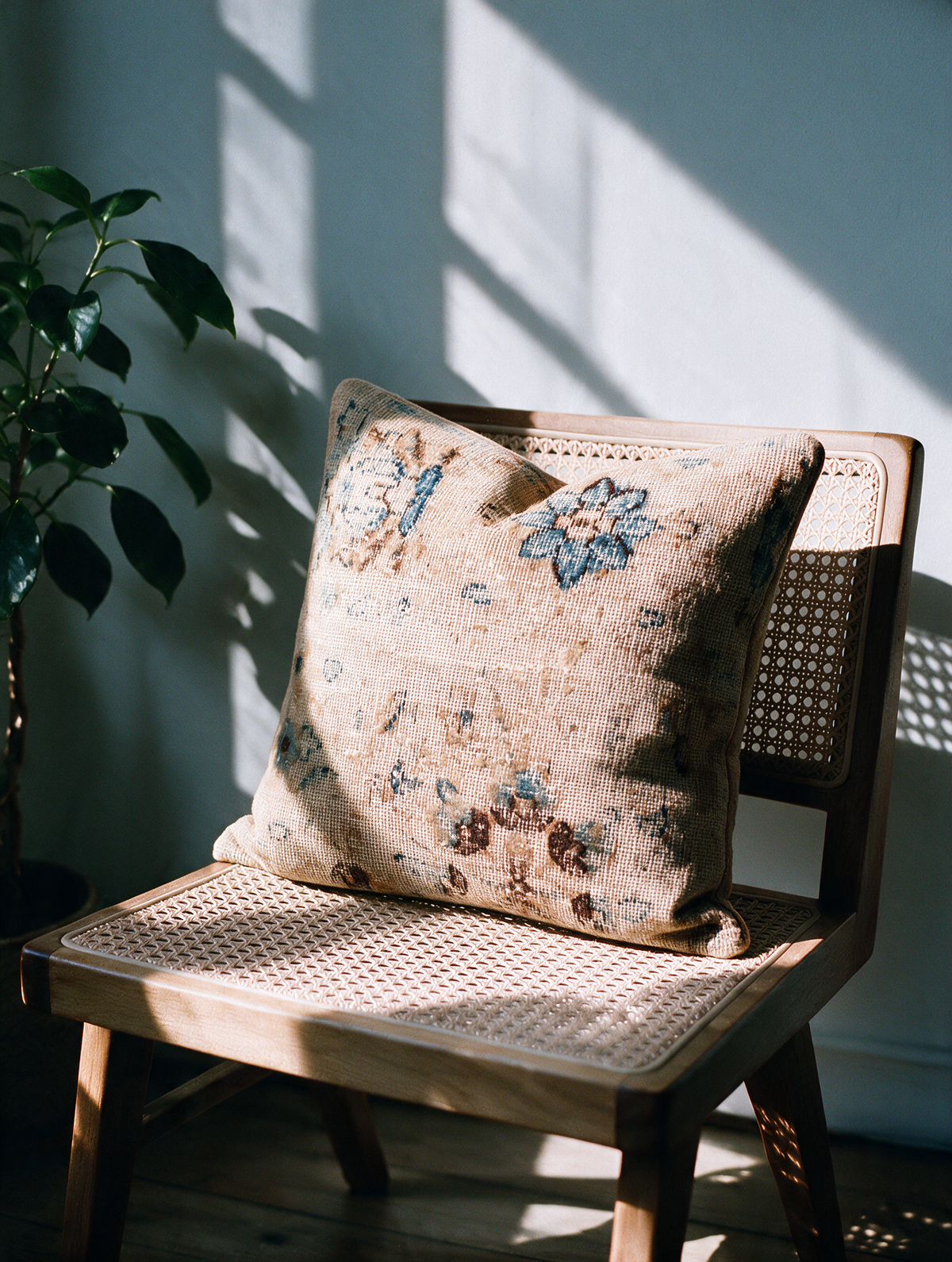 Vintage Persian hand-knotted cushion cover styled lifestyle shot