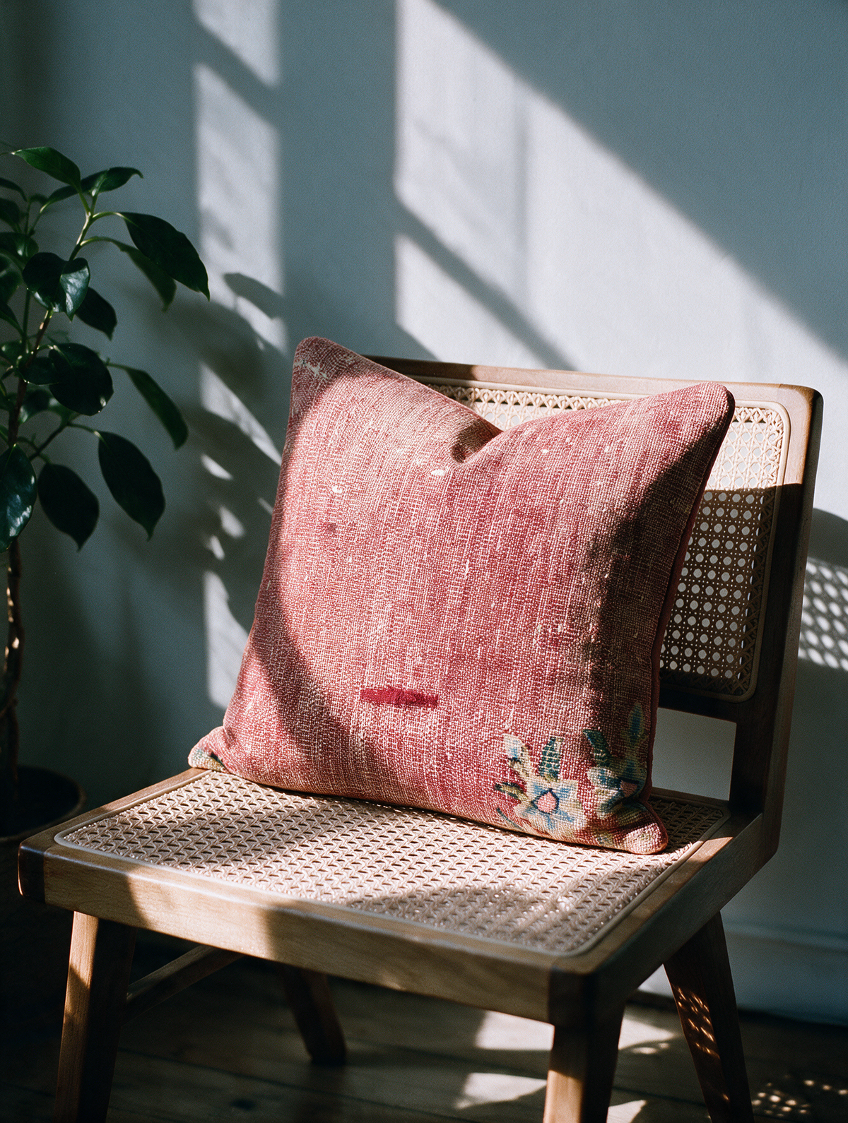 Vintage Persian hand-knotted cushion cover styled lifestyle shot