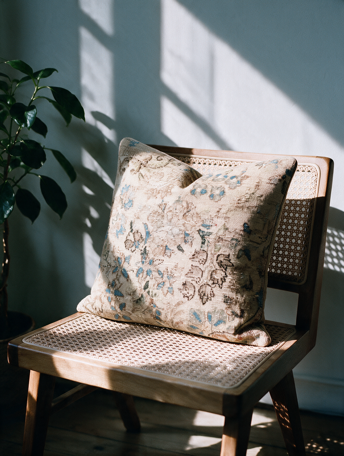 Vintage Persian hand-knotted cushion cover styled lifestyle shot