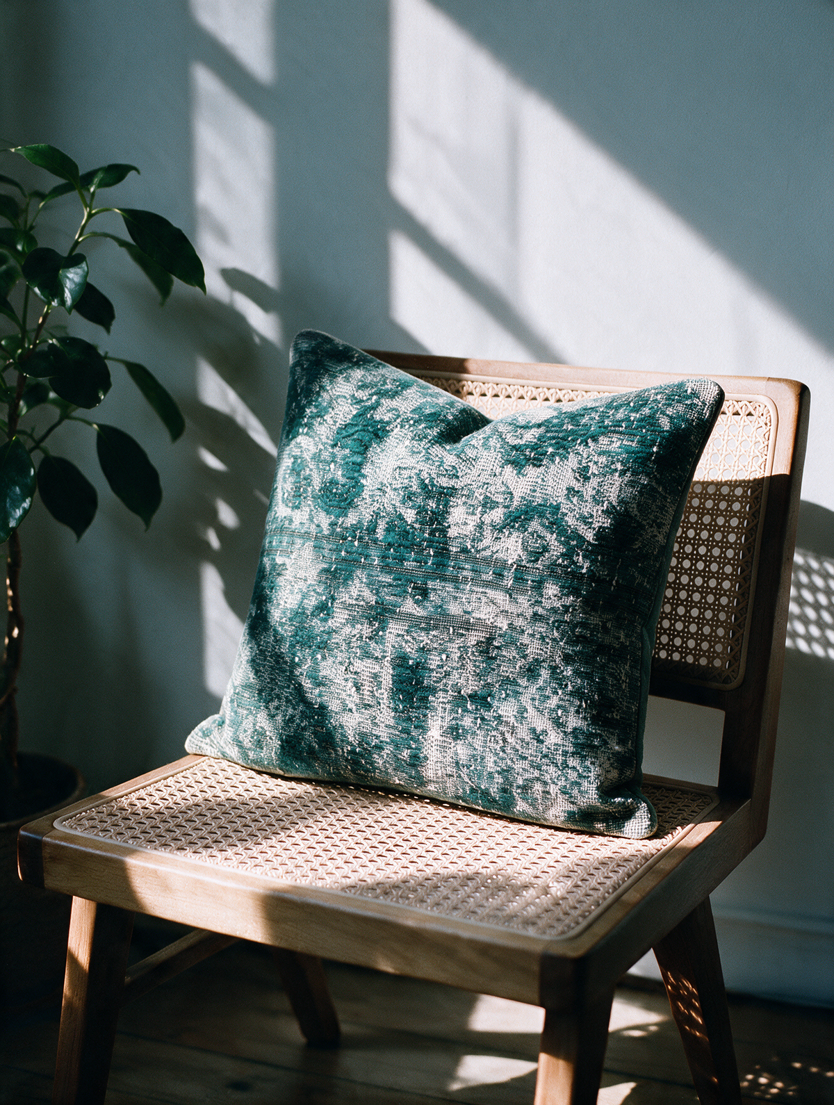 Vintage Persian hand-knotted cushion cover styled lifestyle shot