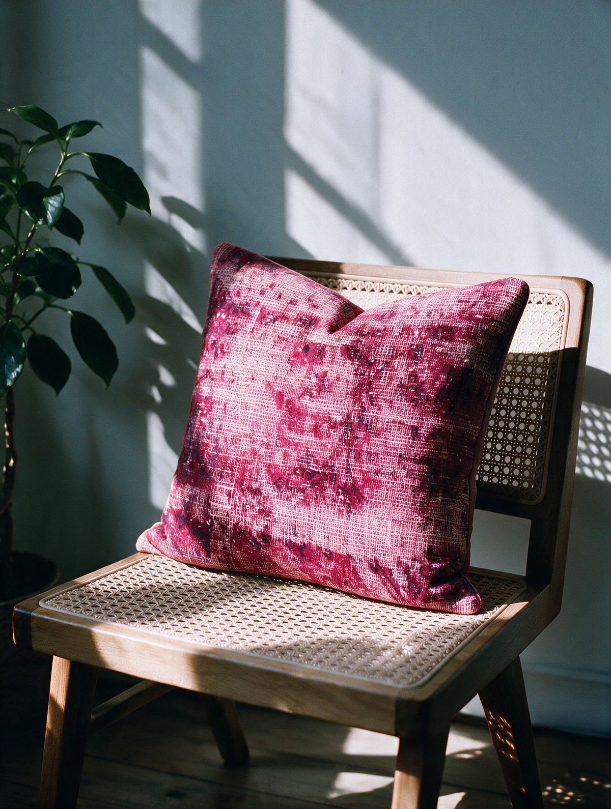 Vintage Persian hand-knotted cushion cover styled lifestyle shot