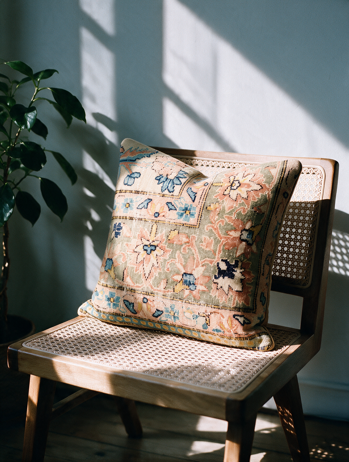 Vintage Persian hand-knotted cushion cover styled lifestyle shot