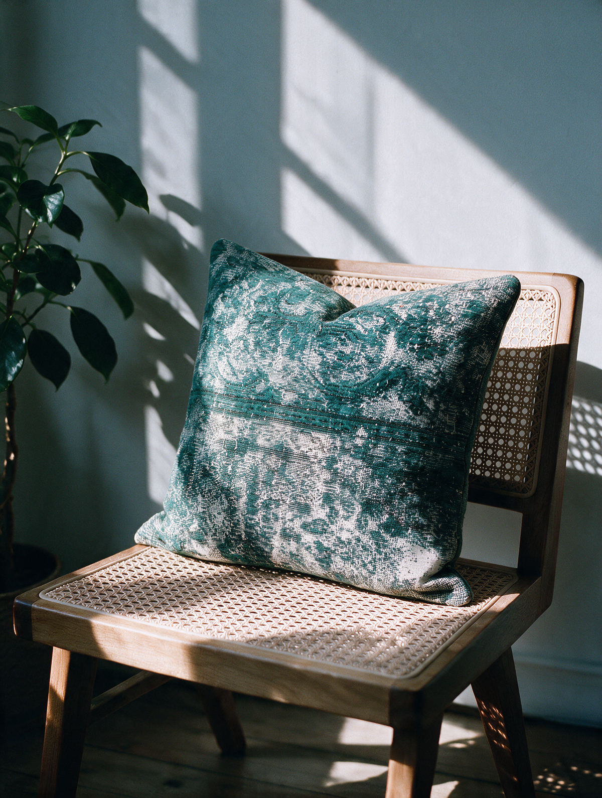 Vintage Persian hand-knotted cushion cover styled lifestyle shot