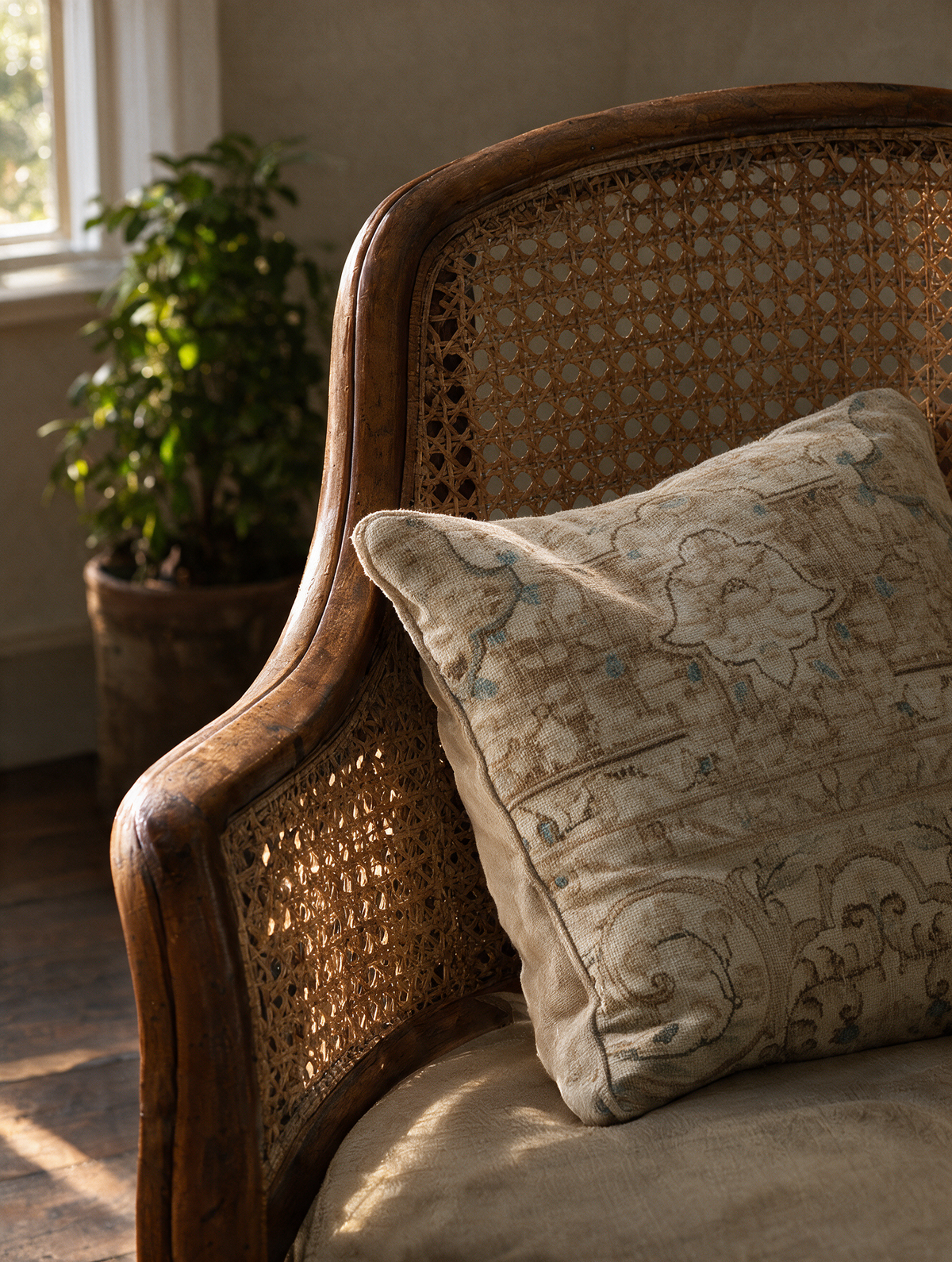 Vintage Persian hand-knotted cushion cover styled lifestyle shot