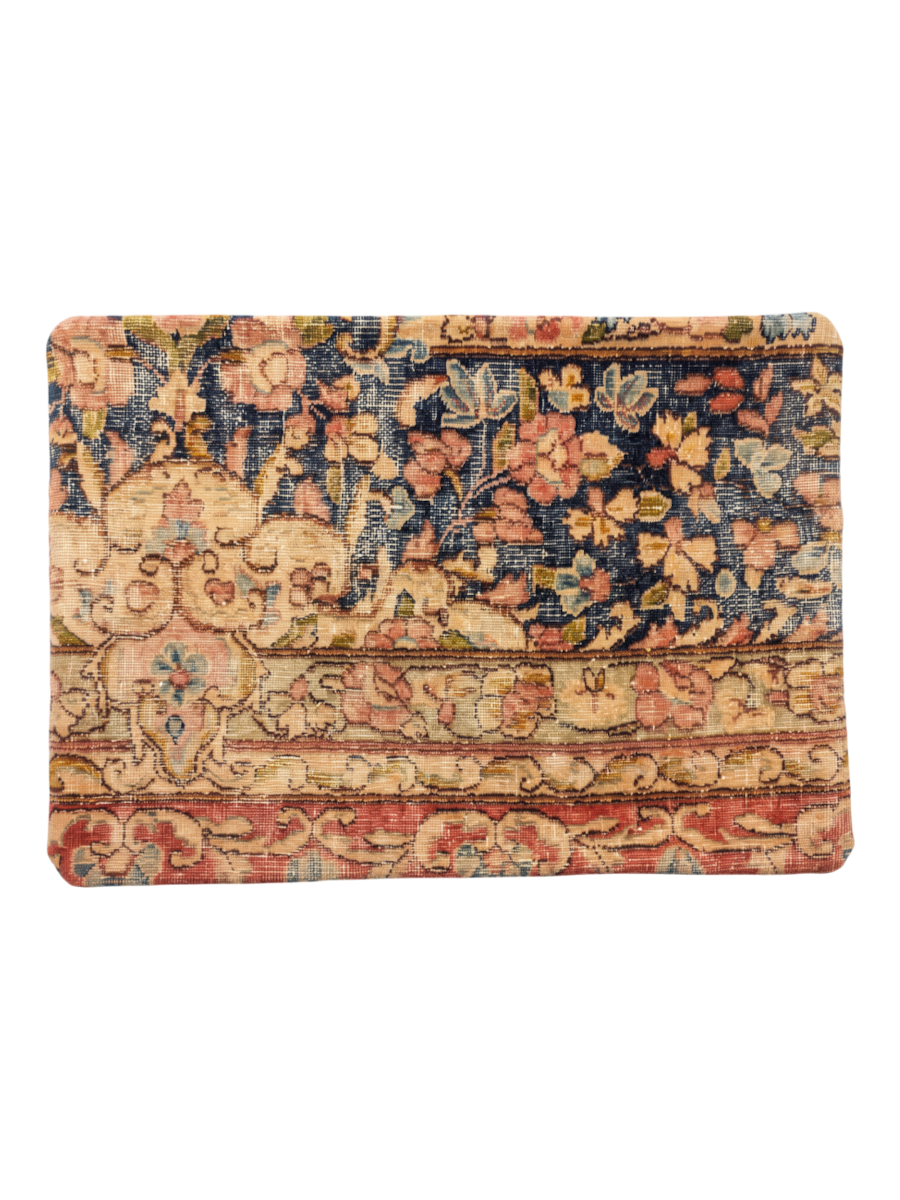 Vintage Persian hand-knotted cushion cover, flat lay
