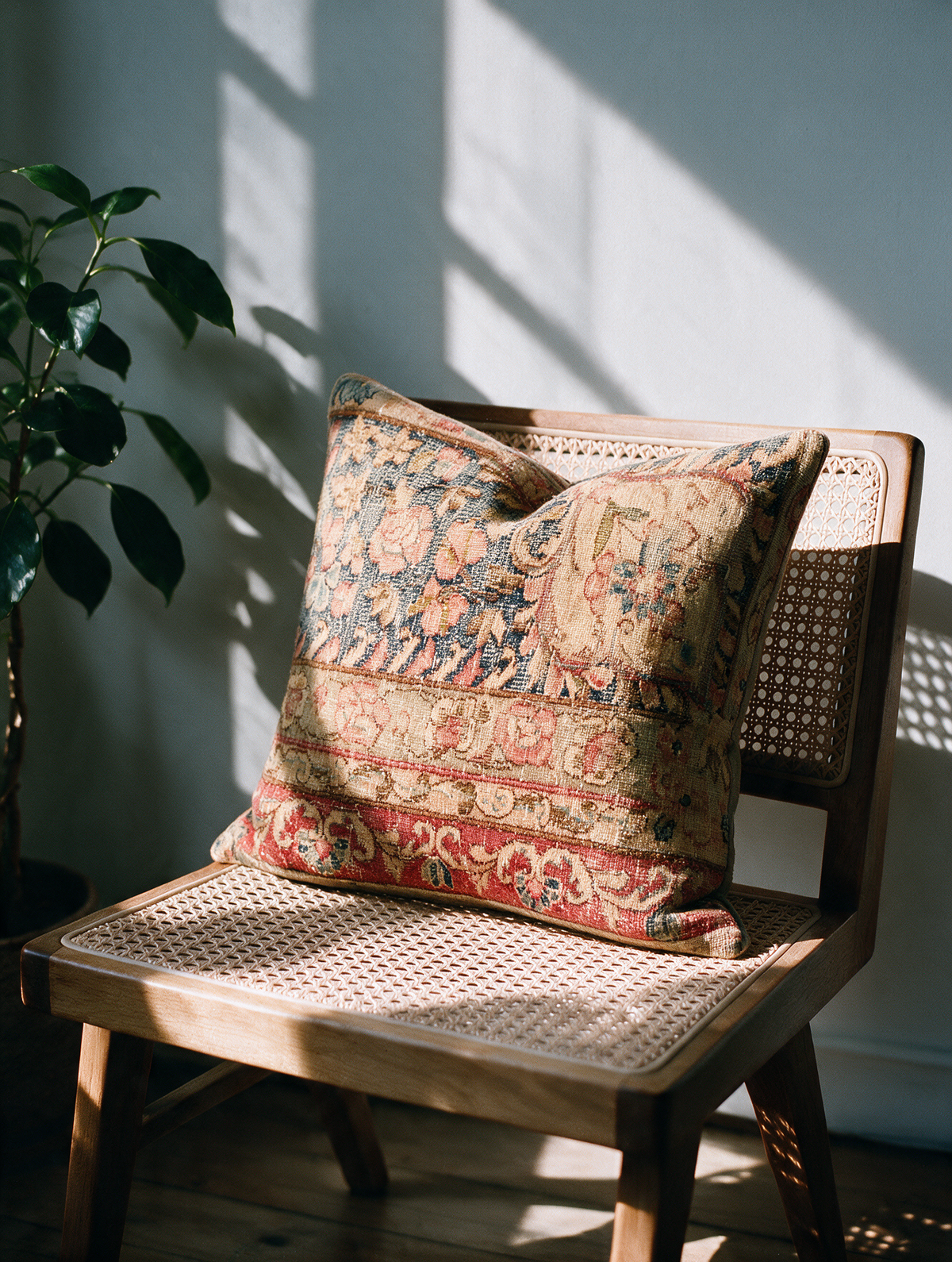 Vintage Persian hand-knotted cushion cover styled lifestyle shot
