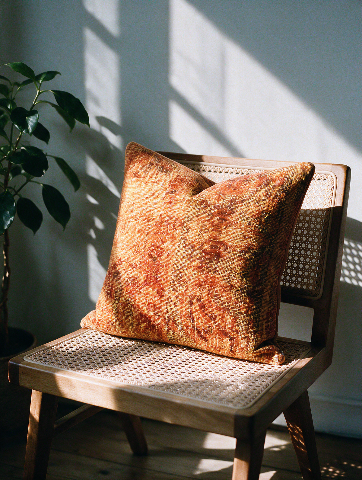 Vintage Persian hand-knotted cushion cover styled lifestyle shot