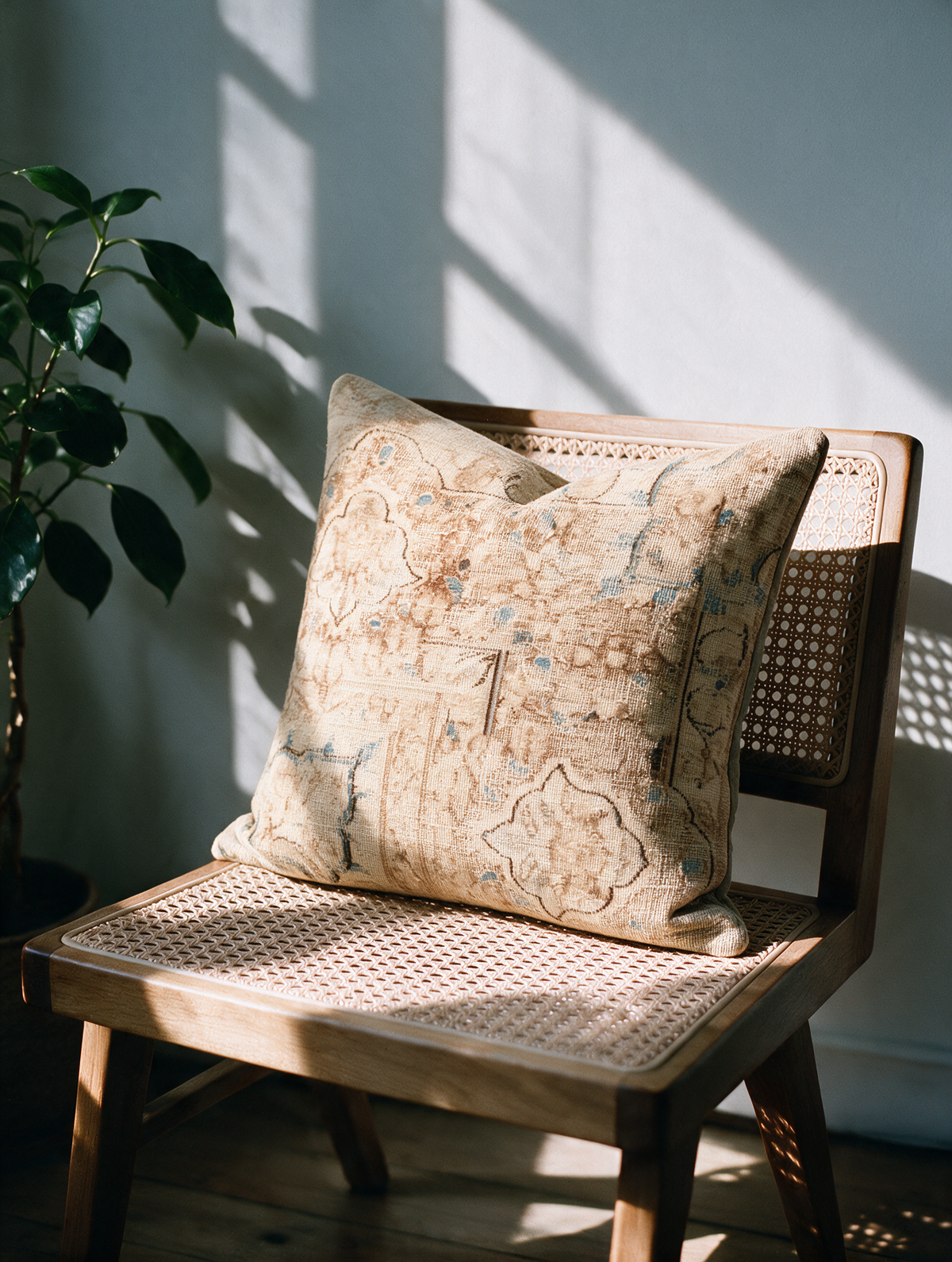Vintage Persian hand-knotted cushion cover styled lifestyle shot