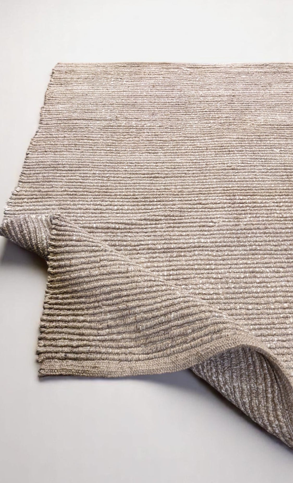 Braided Natural Jute Rug - 201 x 146 cm